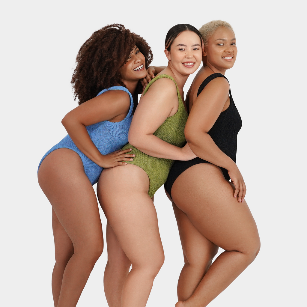 Mixed group of women wearing the one size crinkle swimsuit