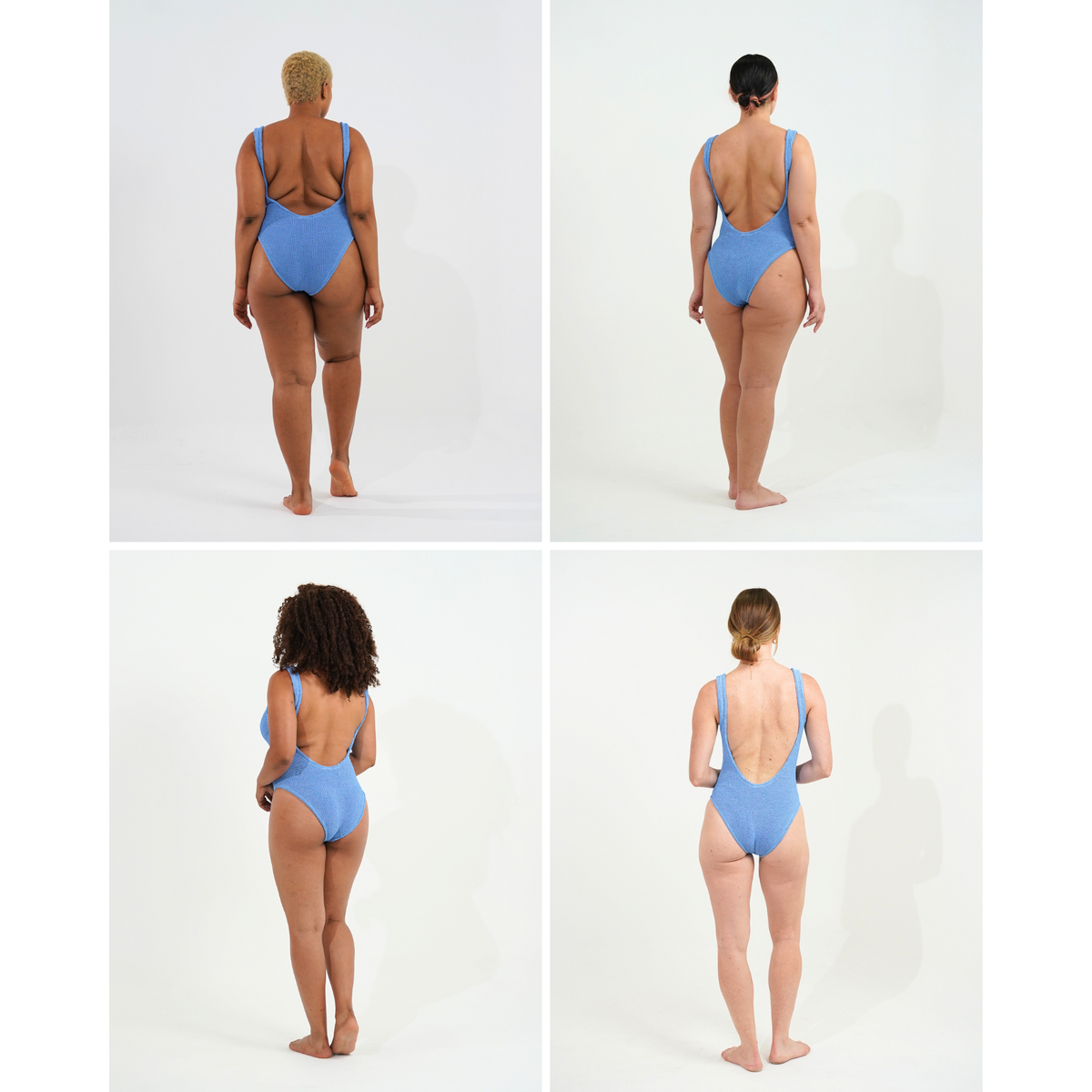 Back view of models wearing the crinkle swimsuit in cornflower blue