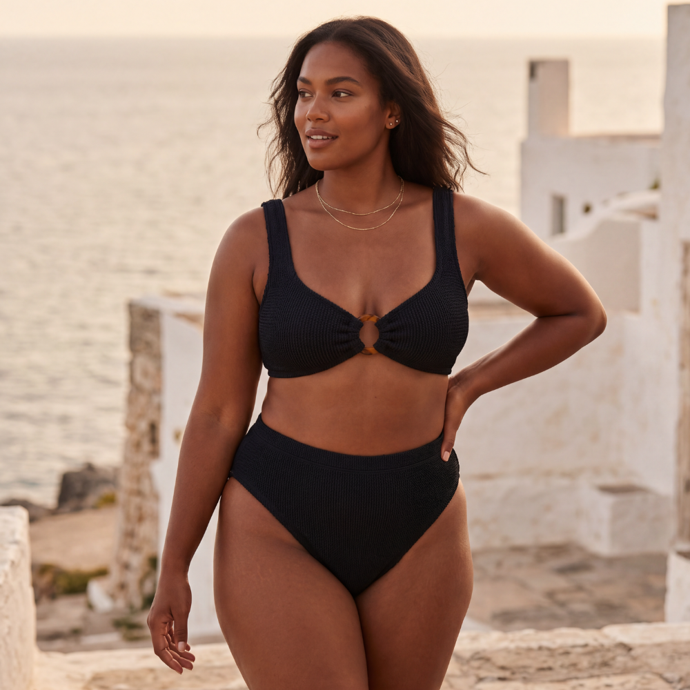 Curvy model wearing the Portofino bikini with high waisted bottoms by the Mediterranean