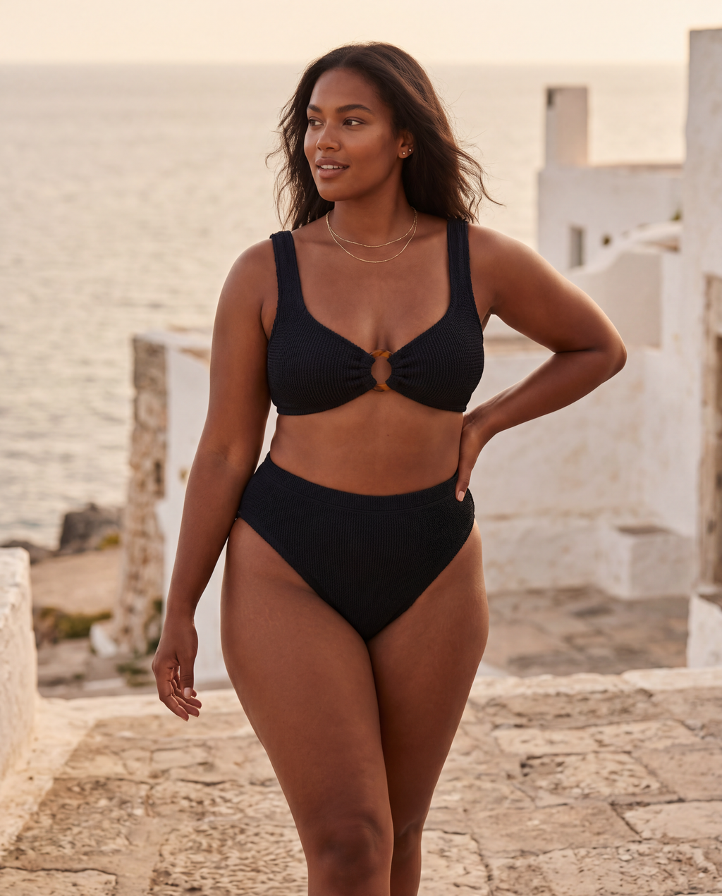 Curvy model wearing the Portofino bikini by the Mediterranean