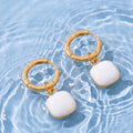 Marla gold and white enamel earrings in water