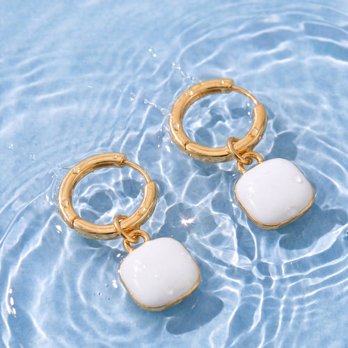Marla gold and white enamel earrings in water